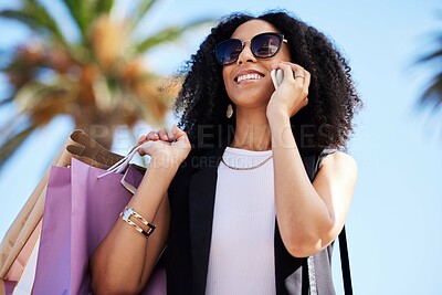 Buy stock photo Black woman, shopping bag and phone call outdoor in New York for fashion, happy customer conversation and travel. African girl, smartphone discussion and retail boutique products in city street 