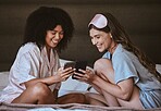 Woman, friends and phone on bed with smile for social media, networking or funny meme together at home. Happy women smiling, laughing and relaxing for post or smartphone entertainment in the bedroom