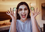 Cucumber, portrait and skincare facial for woman in a bedroom, grooming and having fun with skin treatment. Face, mask and girl relax with fruit product, hygiene and beauty, wellness or detox at home