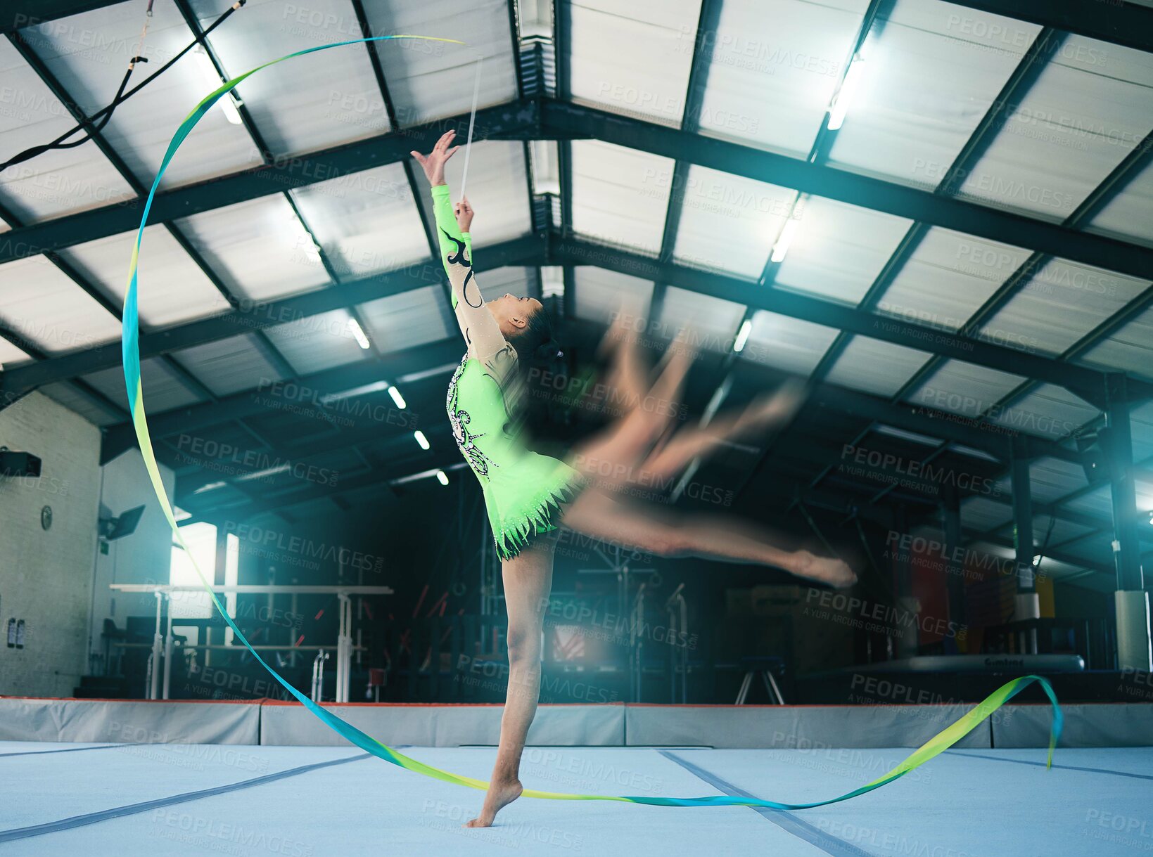 Buy stock photo Gymnastics, motion blur and ribbon dance with a woman in  a gym training for the olympics competition. Fitness, art and rhythmic dancing with female gymnast in a studio for a workout or exercise