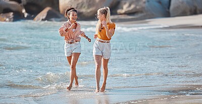 Buy stock photo Couple on beach, lesbian and happy in ocean, gay women outdoor with adventure and freedom to love. Interracial relationship, laughter and holiday in Australia, lgbtq with travel and running in water