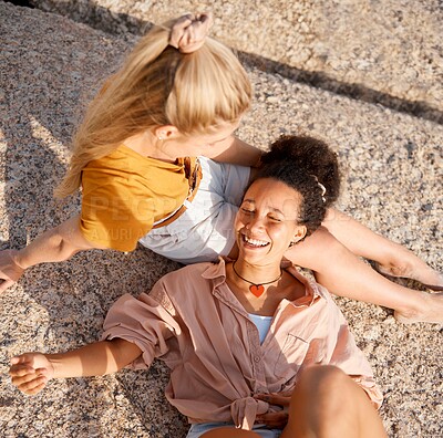 Buy stock photo Above, friends and relax at the beach for summer, vacation and bonding while lying on the ground together, happy and laugh. Smile, travel and women on floor with peace, freedom and chilling outdoors