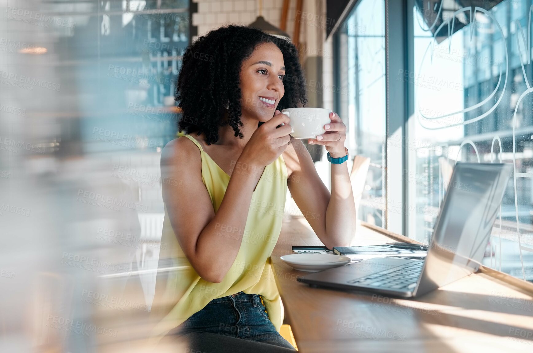 Buy stock photo Window, laptop and coffee shop with a black woman blogger drinking a beverage during remote work. Internet cafe, freelance and startup with an attractive young female working in a restaurant