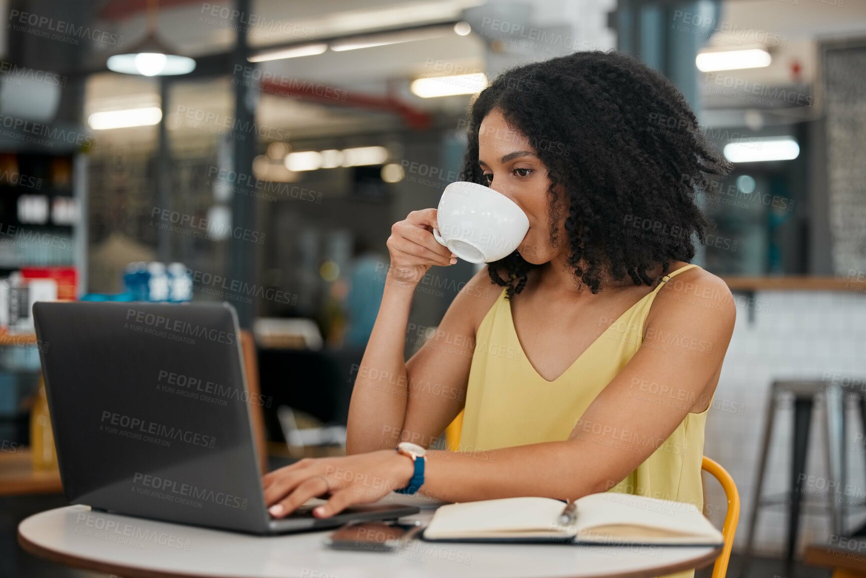 Buy stock photo Coffee, internet cafe and laptop with a black woman blogger doing research while doing remote work. Restaurant, freelance and startup with a female entrepreneur working on her small business blog