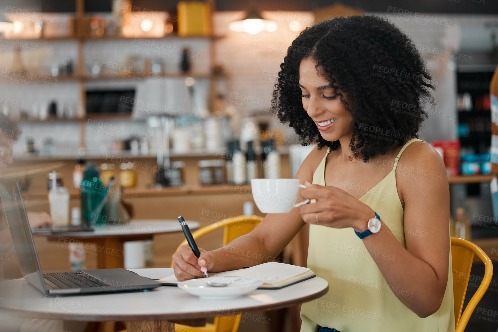 Buy stock photo Coffee shop, laptop and woman writing notes for a freelance project while drinking a espresso. Technology, notebook and female freelancer from Mexico planning business report with a cappucino in cafe