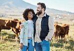 Happy, cow and love with couple on farm for agriculture, nature and growth. Teamwork, animals and hug with man and woman in grass field of countryside for sustainability, cattle and environment