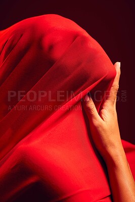 Buy stock photo Woman, red fabric and hide face for fashion, aesthetic and sensual with dark studio background. Gen z model, cloth or silk veil for creativity, vision and art with retro, vintage or creative clothes