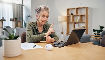 Buy stock photo Serious senior woman on video call for investment, retirement or financial virtual communication with paperwork. Documents, taxes and elderly person talking on laptop for client experience or problem