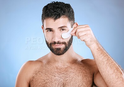 Buy stock photo Skincare, eyes patch and portrait of man, beauty and dermatology on studio background. Male model, face and eye care product for body mask, healthy cosmetics and wellness of facial collagen treatment
