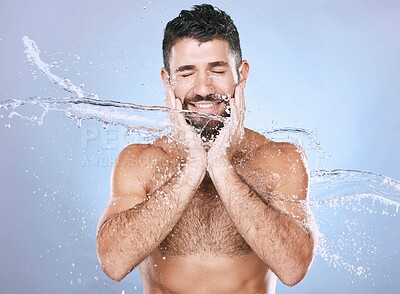Buy stock photo Man, water splash and face skin care for clean spa facial for beauty, hygiene and dermatology. Aesthetic model person blue background for health and wellness cosmetics, body glow and detox cleaning