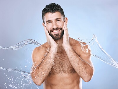 Buy stock photo Water splash, skin care and man portrait for clean spa facial for beauty, hygiene and dermatology. Aesthetic model person on blue background for health and wellness cosmetics mockup, body and detox