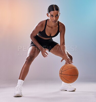 Buy stock photo Portrait, basketball player or black woman isolated on gradient background in action, challenge and body workout. Indian person or fitness model in studio training, exercise and ball in focus mindset