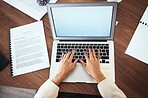 Laptop, mockup and hands of woman typing business report, proposal or feedback on paper from above. Freelance writer or journalist writing web article with internet research and documents in office.