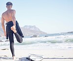 Back, man and stretching for beach surfing with waves, freedom and summer in Cape Town, South Africa. Surfer guy warm up legs at sea, sunshine and travel for water sports, adventure and ocean nature 