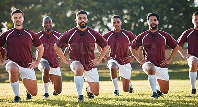 Buy stock photo Rugby, racial activism or team take a knee in solidarity or support for a match, game or sports match. Men, fitness or group of male athletes in unity against inequality or global racism on grass
