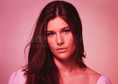 Buy stock photo Portrait, neon and gen z with a model woman in studio on a pink background for beauty or skincare. Face, art and fantasy with an attractive young female posing on a color wall for a retro aesthetic