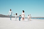 Mother, father and children walking on beach with grandparents on summer holiday, vacation and weekend. Happy family, travel and mom, dad and kids holding hands for fun, bonding and quality time