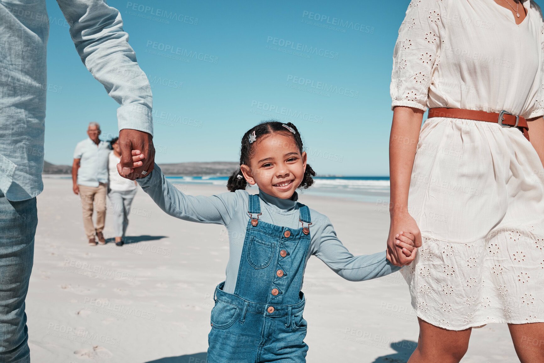 Buy stock photo Mother, father and girl holding hands by the beach to relax on summer holiday, vacation and weekend. Happy family, travel and portrait of child with mom and dad for fun, bonding and quality time