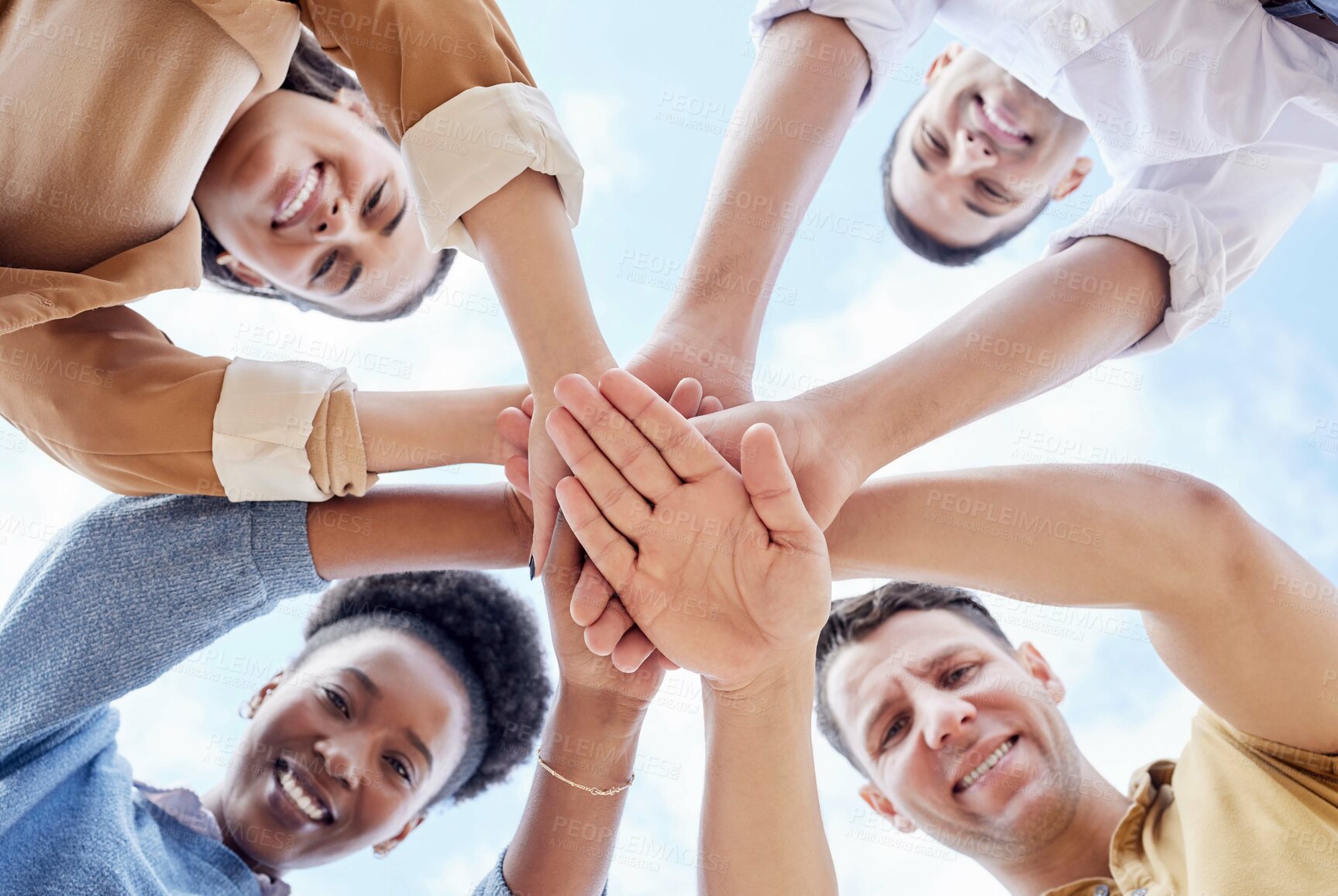 Buy stock photo Below circle, hand stack and business people with support, smile and portrait for goal motivation. Men, women and hands together for solidarity, diversity and happiness with team building at job