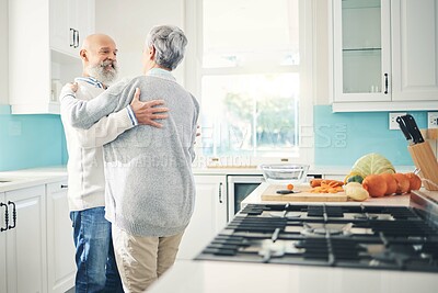 Buy stock photo Dance, love and a senior couple in the kitchen of their home together during retirement for bonding. Happy, smile or romance with a mature man and woman pensioner dancing while having fun in a house