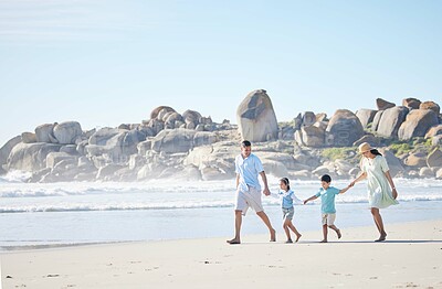 Buy stock photo Beach, walking and family holding hands while on a vacation, holiday or adventure. Freedom, love and children with their parents bonding together by the ocean or sea on a tropical summer weekend trip