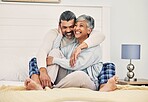 Hug, happy or old couple in bed to relax, enjoy romance or  morning time together at home in retirement. Embrace, senior woman or funny elderly man laughing or bonding with love, support or smile 