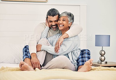 Buy stock photo Hug, happy or old couple in bed to relax, enjoy romance or  morning time together at home in retirement. Embrace, senior woman or funny elderly man laughing or bonding with love, support or smile 