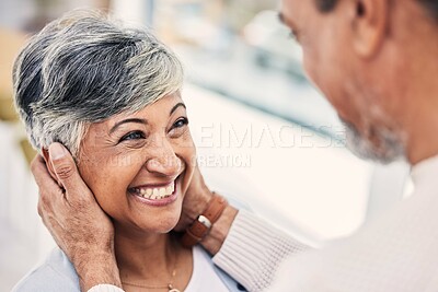 Buy stock photo Senior, happy or old couple in living room with love, care or joy bonding together on holiday at home. Eye contact, elderly man or mature woman in celebration for anniversary romance in retirement
