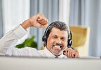 Call centre, celebrate and a happy man at a computer with success, achievement or bonus win. Mature male consultant or agent with fist for customer service, help desk and crm or telemarketing target