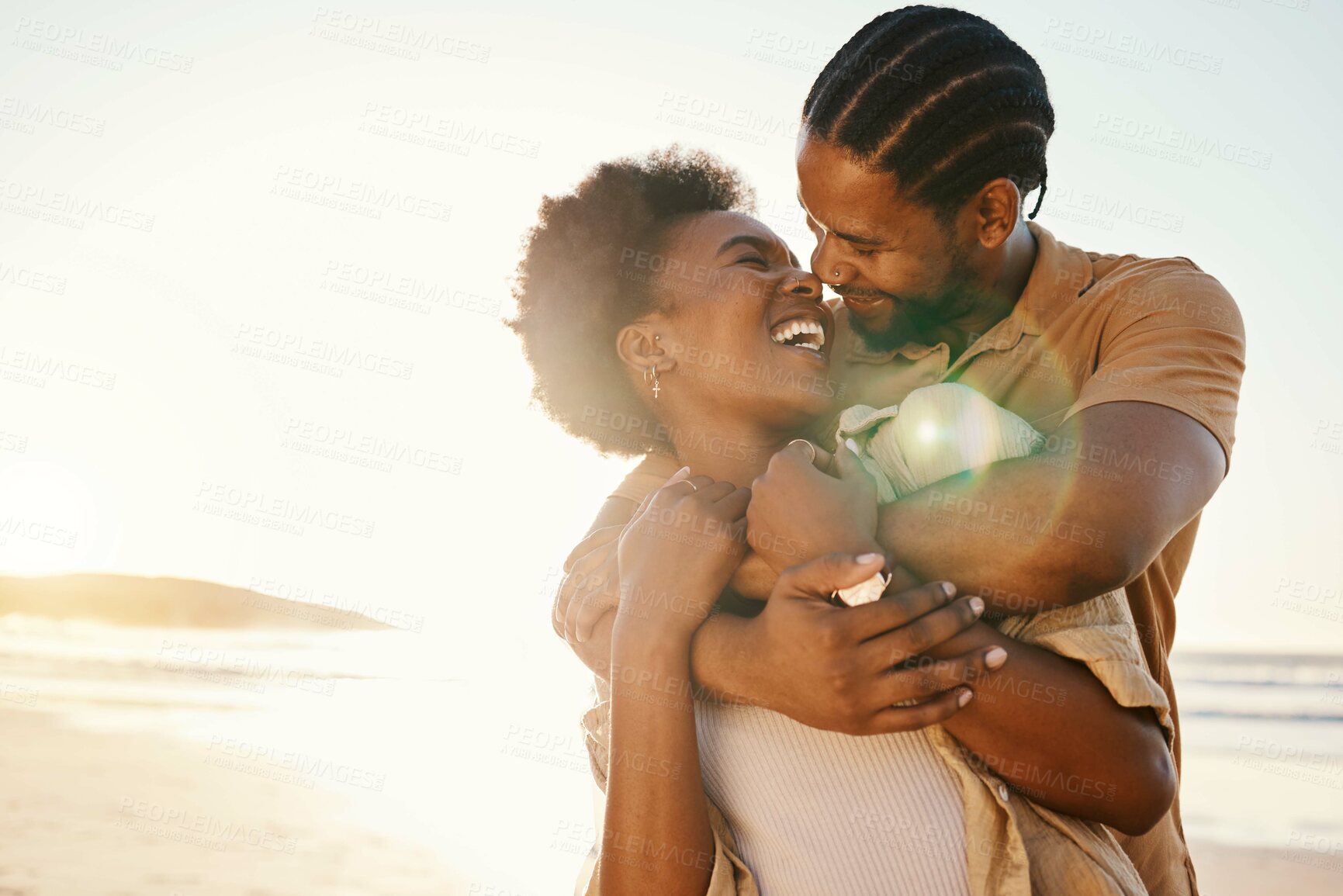 Buy stock photo Beach sunset, sunshine or black couple hug, laugh and enjoy fun time together, funny joke or relationship humour in DRC. Comedy, flare or hugging African people connect, care and bond on holiday date