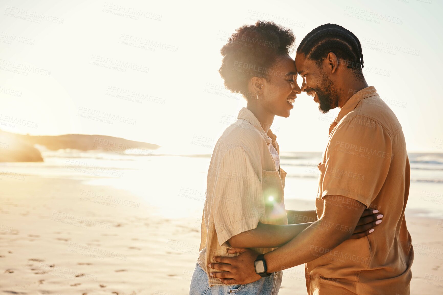 Buy stock photo Beach sunset, forehead and laughing black couple bonding, connect and enjoy relax summer, funny joke or honeymoon together. Romantic love, flare and African people on holiday, intimate date or travel