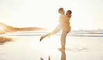 Beach, sunset and happy couple hug, love enjoy quality time together on South Africa vacation, travel or romantic date. Marriage partner, happiness and excited people embrace on anniversary holiday