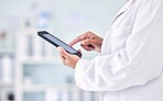 Doctor, phone and hands typing in research, social media or communication and networking at hospital. Closeup of medical nurse or healthcare professional on mobile smartphone for health app at clinic