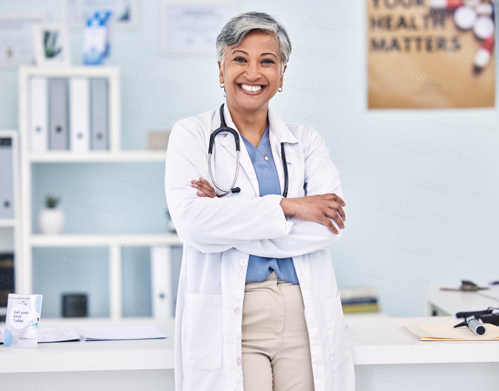 Buy stock photo Happy senior woman, doctor and professional with arms crossed in confidence for healthcare at hospital. Portrait of mature female person, medical expert or surgeon smile for health service at clinic