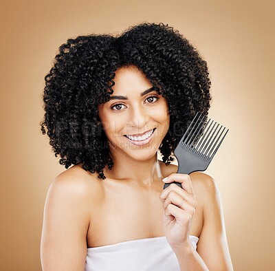 Buy stock photo Portrait, hair care and woman with a comb, curls and salon grooming with keratin on brown background. Face, person or model with beauty, shine or glow with volume, cosmetics or smile with aesthetic