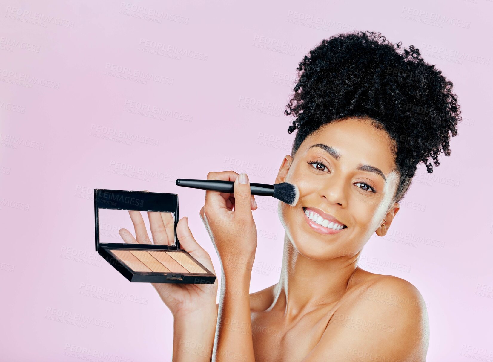 Buy stock photo Makeup brush, palette and studio portrait of happy woman with tools, beauty product or cosmetics powder choice. Mirror, facial cosmetology treatment and face of dermatology person on pink background