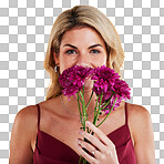 Portrait, smell and woman with flowers, beauty and confident girl against a studio background. Face, female person and model with plants, natural care and floral present with lady, bouquet and scent