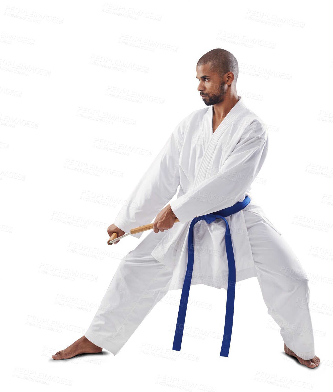 Buy stock photo Karate, uniform and a man training with nunchucks isolated on a transparent background for self defense. Combat, weapon or equipment with a young sports athlete on PNG to practice for fitness
