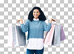 Shopping, black woman and portrait of a happy customer with bags after boutique or shop sale. Isolated, gray background and female smile in a studio holding a bag with discount market product