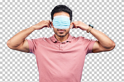 Face mask, cover eyes and a man with blindfold isolated on a blue background in a studio. Struggling, virus and a person with covid wearing a tool to protect from sickness, hiding facial sight