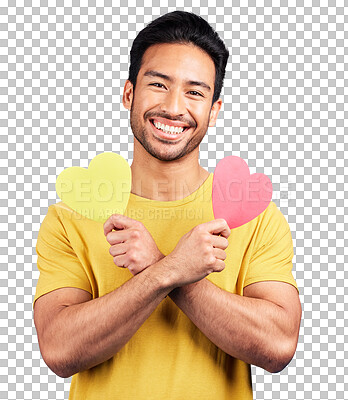 Portrait, smile and man with heart cutout in studio isolated on a blue background. Love, happiness and Asian person with symbol, sign or emoji for affection, care and romance, empathy and valentines.
