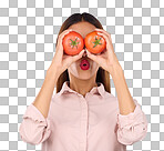 Woman, tomato and covering eyes in studio for healthy food, vegan diet and vegetable in hands. Face of a model person with red vegetables for health, wellness and skin care on purple background