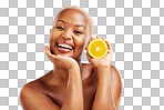 Portrait, beauty and orange with a black woman in studio on a bl