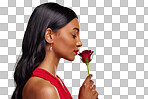 Face, woman and smelling a rose on a studio background for valen
