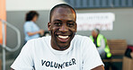 Man, volunteer and smile in portrait, charity and outreach program for society in outdoors. Happy black person, nonprofit and support in social responsibility, NGO foundation and community service