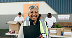 Woman, clipboard and manager in charity, volunteer and organizer for outreach program, smile and portrait. Happy senior person, non profit and support in social responsibility for NGO foundation