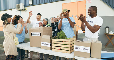 Buy stock photo Volunteer, celebration and people with box for donation, charity drive and community service. Collaboration, volunteering and excited men and women clapping for success in NGO, recycle and teamwork