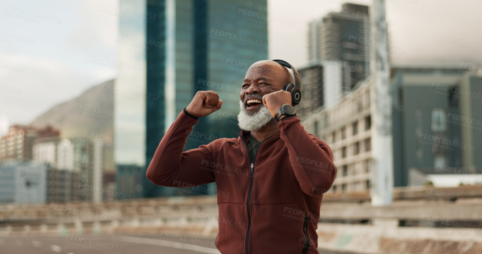 Buy stock photo Fitness, excited and senior man, headphones, city and achievement with workout, streaming music and radio. African person, pensioner and runner with headset, progress and exercise wellness or outdoor