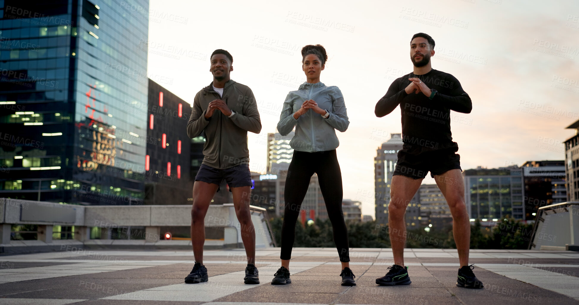 Buy stock photo People, fitness and outdoor in city, workout and evening for exercise, group and strong. Training, cardio or sportswear for athlete, town or sports strength, men or woman for active, squat or muscle