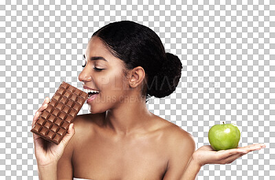 Buy stock photo Woman, chocolate and apple as decision or diet choice, isolated on transparent png background. Indian person, candy and fruit or discipline health balance as sugar craving, lose weight or sweet snack